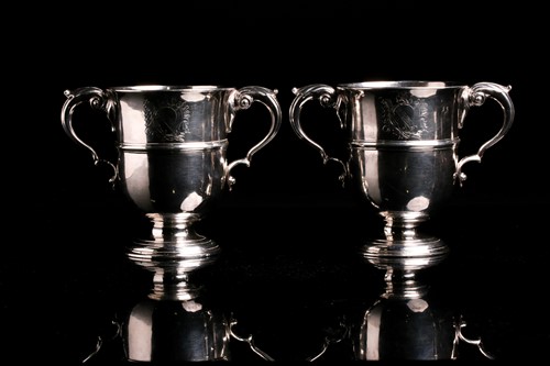 Lot 573 - A pair of George III(?) Irish silver loving...