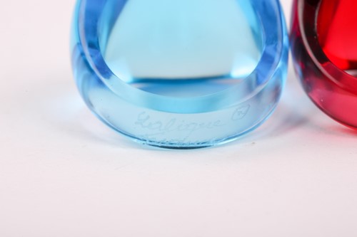 Lot 128 - A red glass Lalique bombe ring, engraved...