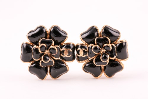 Lot 134 - Chanel. A pair of black Gripoix Camellia...