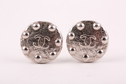 Lot 261 - Chanel. A pair of silver coloured vintage...