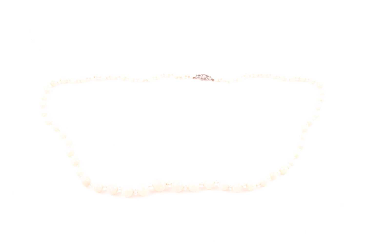 Lot 77 - An early to mid 20th century opal beaded...