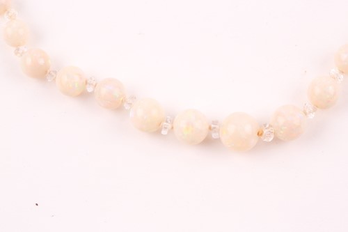 Lot 77 - An early to mid 20th century opal beaded...