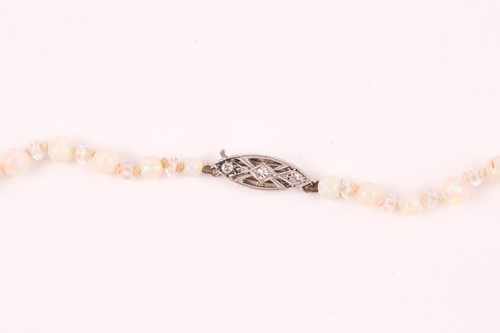 Lot 77 - An early to mid 20th century opal beaded...