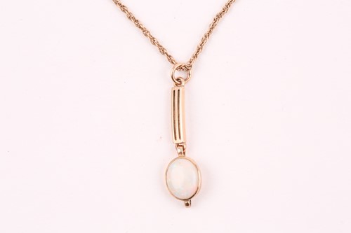Lot 148 - A yellow metal and opal drop pendant,...