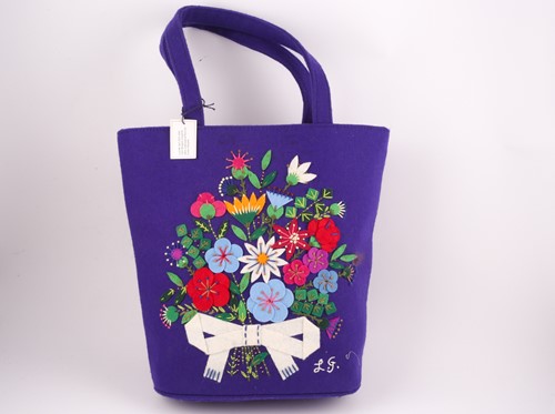 Lot 422 - A Lulu Guiness embroidered wool felt handbag,...