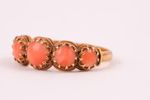 Lot 110 - A Georgian yellow gold and coral ring, set...
