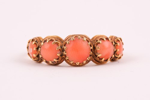 Lot 110 - A Georgian yellow gold and coral ring, set...