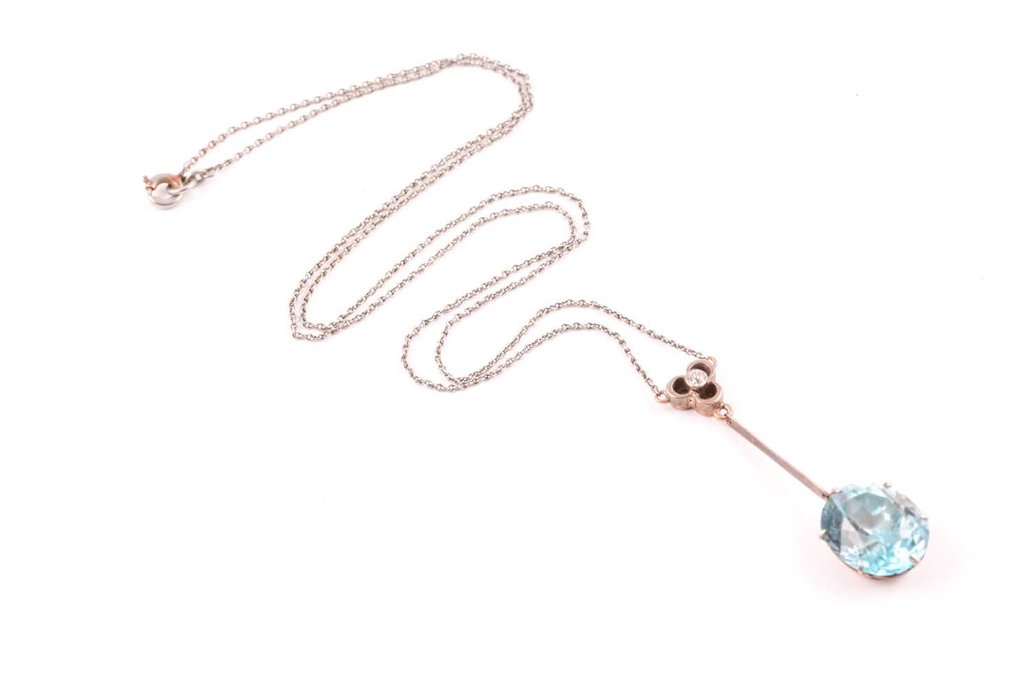 Lot 75 - An early 20th century blue zircon drop pendant...