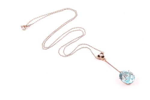 Lot 75 - An early 20th century blue zircon drop pendant...