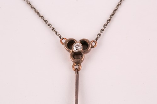Lot 75 - An early 20th century blue zircon drop pendant...