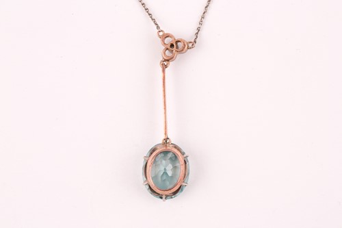 Lot 75 - An early 20th century blue zircon drop pendant...