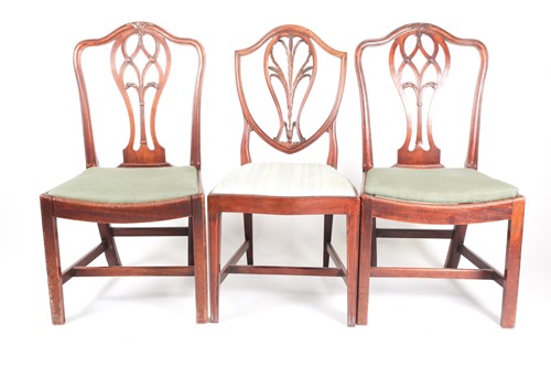 Lot 288 - A pair of George III mahogany camelback side...