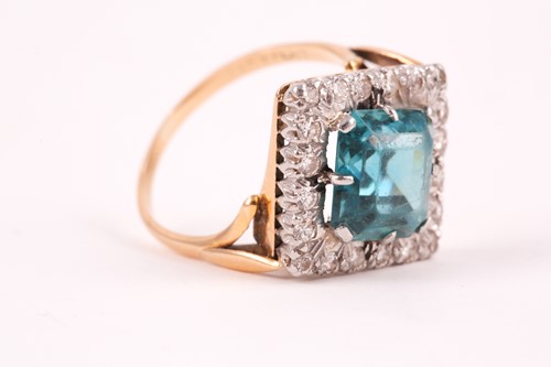 Lot 265 - An 18ct yellow gold, diamond, and blue zircon...