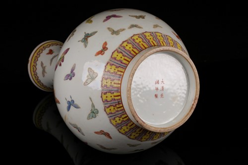 Lot 114 - A Chinese butterfly vase, Guangxu mark and...