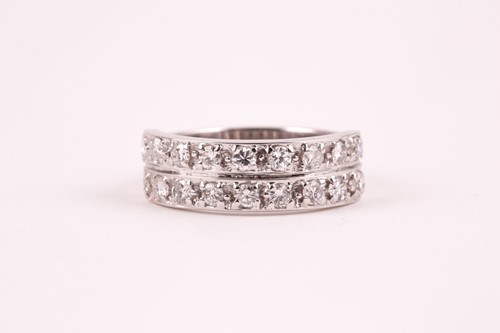 Lot 60 - A double band half eternity diamond ring, set...