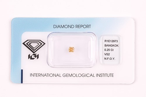 Lot 251 - A loose modified radiant brilliant-cut natural...