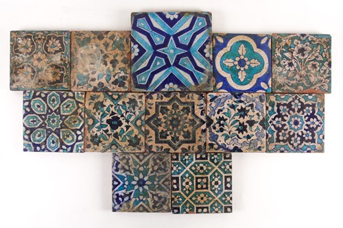 Lot 125 - Twelve Persian Isnik tiles, 19th century,...