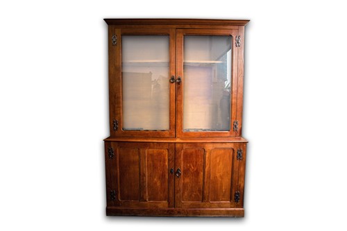 Lot 294 - A craftsman made golden oak glazed gun cabinet....