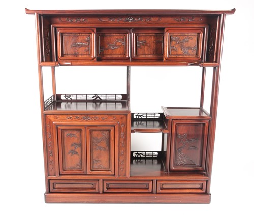 Lot 246 - A contemporary Chinese hardwood display unit,...