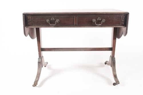 Lot 295 - A George III style, mahogany two flap sofa...