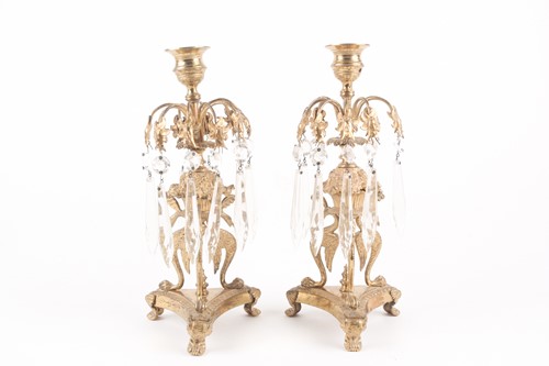 Lot 380 - A pair of Regency ormolu candle lustres, with...
