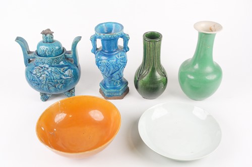 Lot 142 - A Chinese apple green glazed shallow dish,...