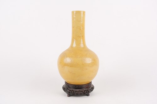 Lot 144 - A Chinese monochrome dragon vase, 19th century,...