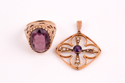 Lot 53 - An Edwardian amethyst and split pearl pendant,...