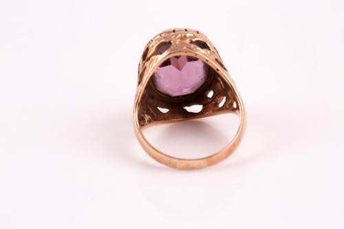 Lot 53 - An Edwardian amethyst and split pearl pendant,...