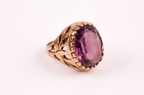 Lot 53 - An Edwardian amethyst and split pearl pendant,...