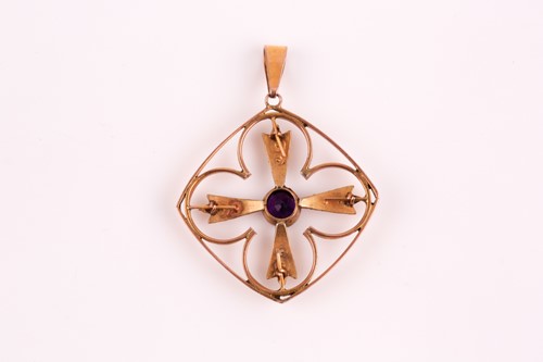 Lot 53 - An Edwardian amethyst and split pearl pendant,...