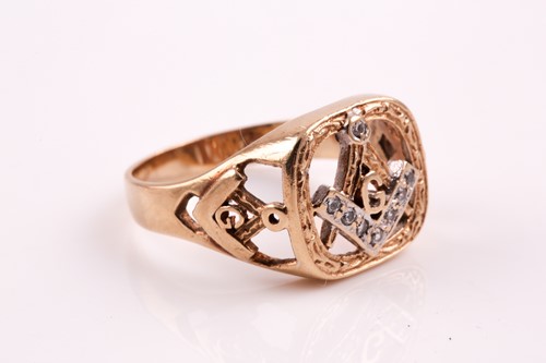 Lot 52 - A 9ct gold and diamond Masonic ring, the large...