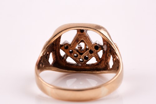 Lot 52 - A 9ct gold and diamond Masonic ring, the large...