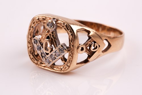 Lot 52 - A 9ct gold and diamond Masonic ring, the large...