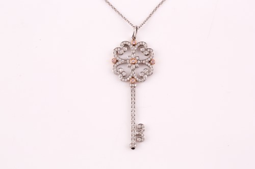 Lot 231 - A Tiffany enchanted key pendant; the diamond...