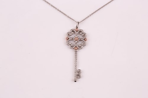 Lot 231 - A Tiffany enchanted key pendant; the diamond...
