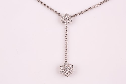 Lot 133 - An Italian diamond double cluster pendant, the...