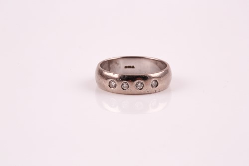 Lot 263 - A platinum and diamond ring; the curved 'D'...