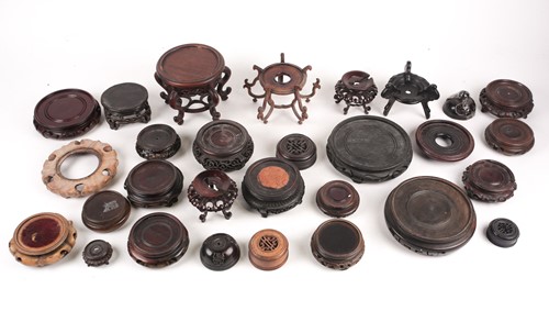Lot 177 - A collection of twenty three Chinese carved...