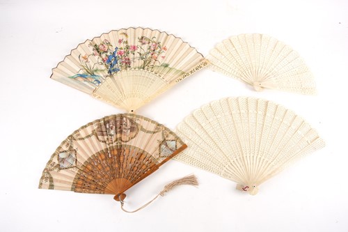 Lot 184 - A Chinese carved ivory fan, 19th century,...