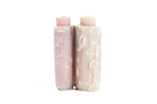 Lot 206 - A Chinese pale green iridescent, carved jade...