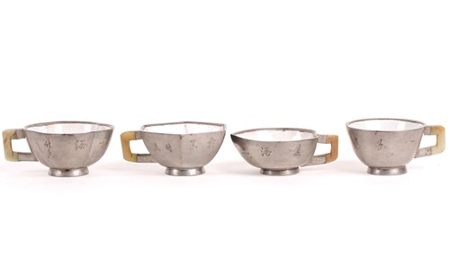Lot 207 - Four Chinese pewter, jade and Yixing teacups,...