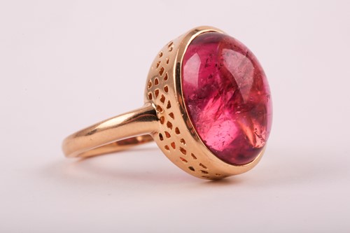 Lot 378 - A yellow metal and tourmaline ring set with an...
