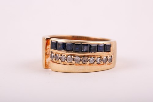 Lot 143 - A yellow metal, sapphire, and white paste...