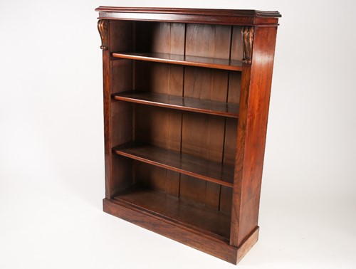 Lot 216 - A Victorian figured walnut open bookcase with...