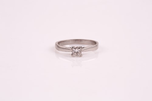 Lot 330 - A single stone diamond ring, the princess cut...