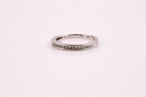 Lot 86 - A half hoop diamond eternity ring, the...