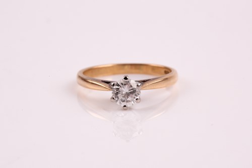 Lot 114 - A single stone diamond ring, the round...
