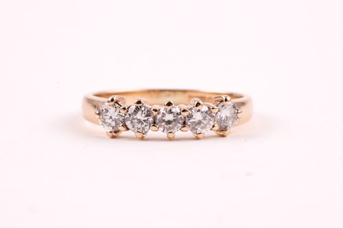 Lot 162 - A 9ct yellow gold and diamond ring, set with...