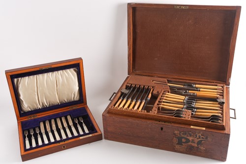 Lot 487 - An Edwardian canteen of silver fruit knives...